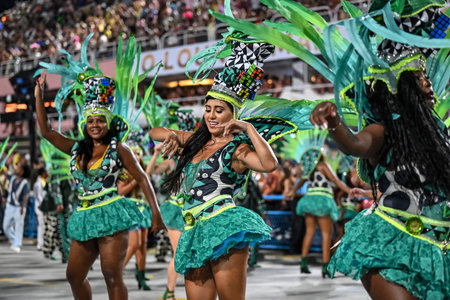 Rio de Janeiro, Brazil - February 14, 2026: A performer from Imperio Serrano samba school parades at...