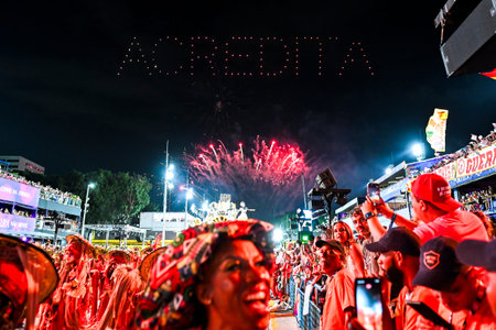 Rio de Janeiro, Brazil - February 14, 2026: A performer from UniÃ£o MaricÃ¡ samba school parades at the Sambadrome during the SÃ©rie Ouro of Rio Carnival 2026.のeditorial素材