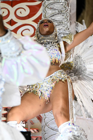 Rio de Janeiro, Brazil - February 15, 2026. A performer Portela samba school parades at the...