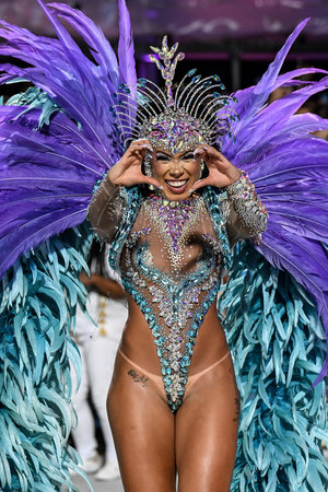 Rio de Janeiro, Brazil - February 15, 2026. A performer Portela samba school parades at the...