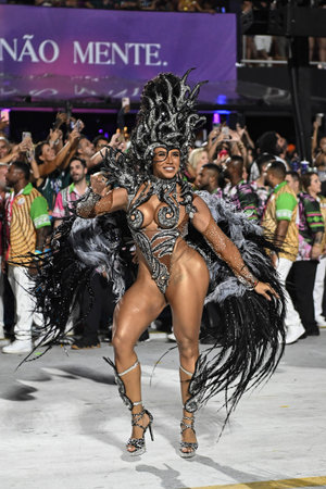 Rio de Janeiro, Brazil - february, 15, 2026 - Group of Mangueira samba dancers perform in formation...