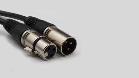 xlr connection cable with one end male, the other end female on a white background
