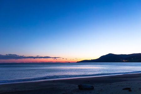 Sunset on the beach of Mediterranean, blue hoursの写真素材