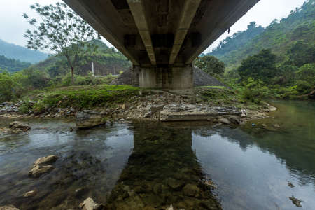 dreaming under a bridge reflectionの写真素材