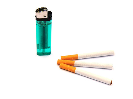 cigarettes and a lighterの写真素材
