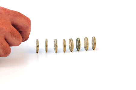 coins ready to knock overの写真素材