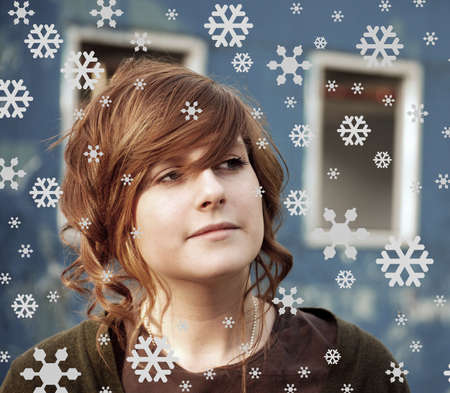 beautiful woman in snowflakesの写真素材