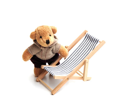 teddy bear and deckchairの写真素材