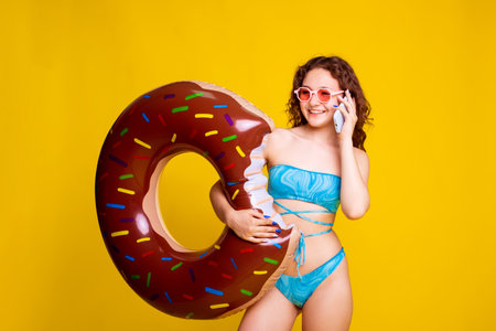 happy teen girl call on smartphoneの写真素材