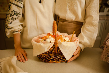 assembled blessed Easter basket on table, family ready to celebrate Easter at homeの写真素材
