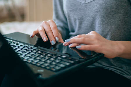 Hipster Girl use Laptop huge Loft Studio.Student Researching Process Work.Young Business Woman Working Creative Startup modern Office.Analyze market stock,new strategy.Blurred,film effect.Horizontalの写真素材