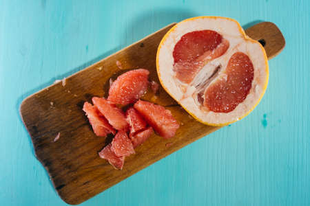 vintage photo of grapefruits on wood tableの写真素材