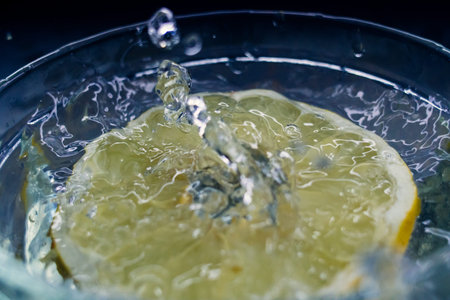 tropical fruits Orange fall deeply under water with a big splash