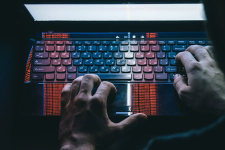 Russian hacker hacking the server in the darkの写真素材