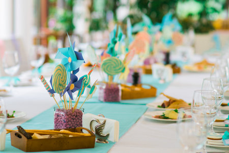 Details of a tasty candy bar with jugs of sweets, cookies and marshmallows