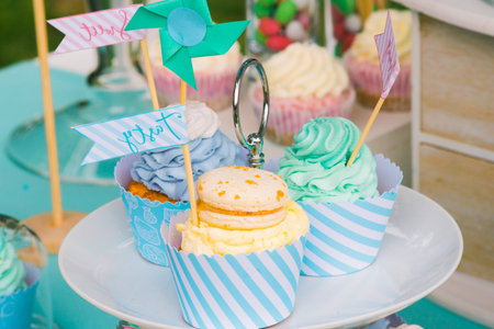 Details of a tasty candy bar with jugs of sweets, cookies and marshmallowsの写真素材