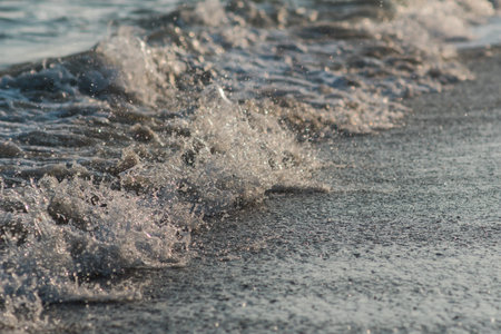 Deep blue stormy sea water surface with foam and waves pattern, natural background photoの写真素材