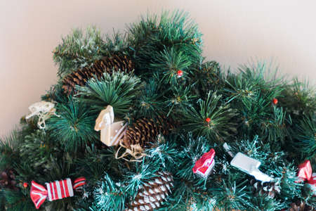 Christmas decorative wreath with leafs of mistletoe isolated on whiteの写真素材