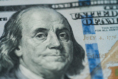Macro close up of Ben Franklin's face on the US 100 dollar bill.の写真素材