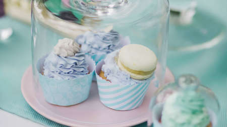 Details of a tasty candy bar with jugs of sweets, cookies and marshmallows, Candy, waffles, cookies and macaroons , sweets conceptの写真素材