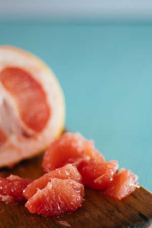 vintage photo of grapefruits on wood tableの写真素材