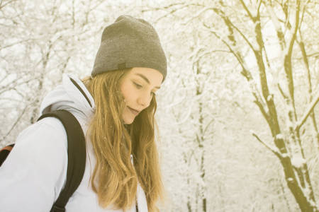 Woman enjoying winter mountains wearing cozy sweater and hat Travel Lifestyle adventure concept vacations intoの写真素材