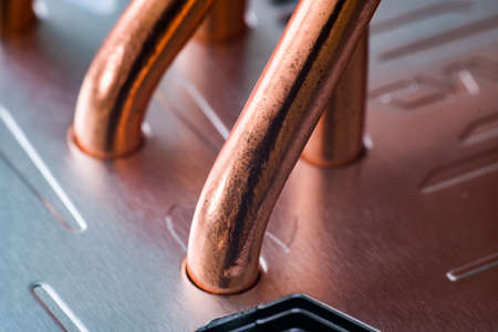 Aluminum radiator with copper heat pipe close-up with beautiful bokeh Metallic backgroundの写真素材