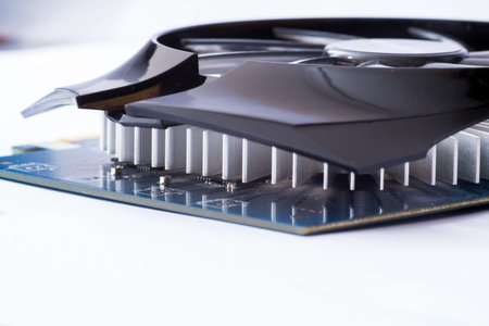 Graphics card with connectors of a different output interfaces and equipped with heat sink without...