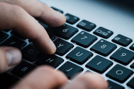 Russian hacker hacking the server in the darkの写真素材