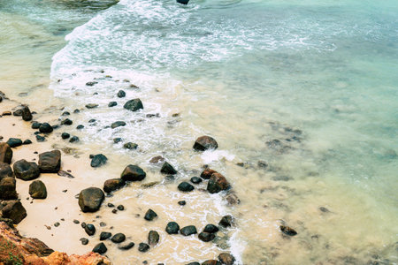 beach stones. beach landscape. few beach stones and the sea.