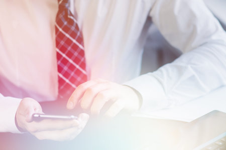 business concept, businessman working on workspace with smartphone