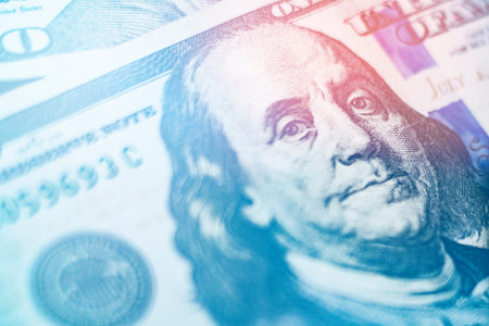 Macro close up of Ben Franklin's face on the US 100 dollar bill.