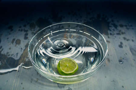 tropical fruits Orange fall deeply under water with a big splashの写真素材