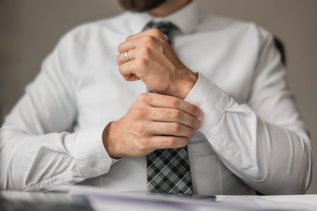 Young bearded businessman Office work with a laptop. Financial business. Light background. Businessman work with computer on table in office work.の写真素材