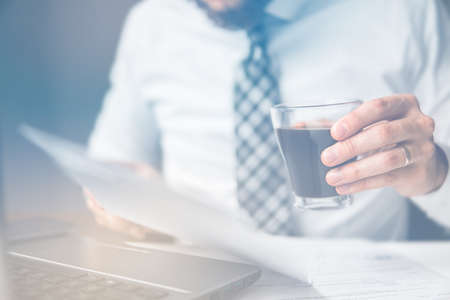 Shopping online. Office work concept. Businessman uses a smartphone. Sending email, mobile phone. Close up telephone. Businessman working with documents White background.の写真素材