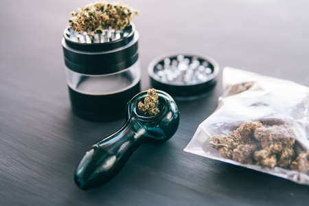 Cannabis buds on black wood background. CBD and THC on budsの写真素材