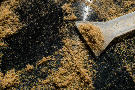 Kief macro in grinder. Sativa medical health. Marijuana Close up. Indica THC CBD.