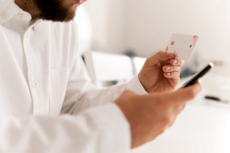using smart phone for online shopping. smartphone and holding credit card with social Online...