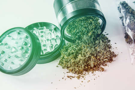 Cannabis buds on white wood background. Copy space. Close up. Blunt and Lighters.の写真素材