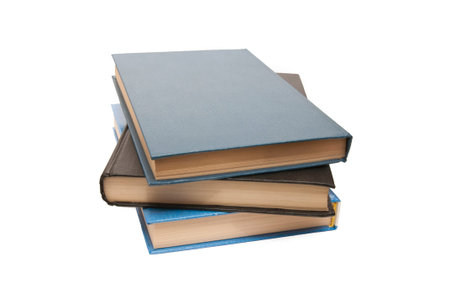 Stack of old antique books isolated on white background