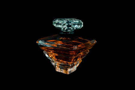 Perfume bottle over a black backgroundの写真素材