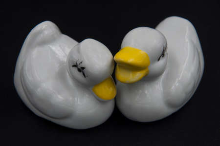 porcelain figurines on a black backgroundの写真素材