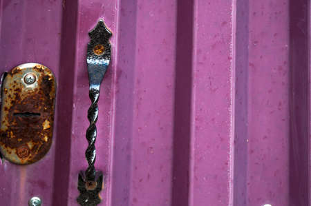 Door rusty handle on the doorの写真素材