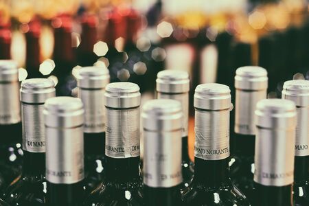 Famous bottles of Italian white and red wine, on sale in a supermarket, Milan, January 2020の写真素材
