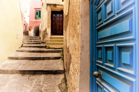 Ancient houses and boats on the island of Procida, Italian town of 10 434 inhabitants in the metropolitan city of Naples in Campania, August 2018, Italyのeditorial素材