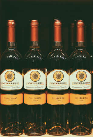 Famous bottles of Italian white and red wine, on sale in a supermarket, Milan, January 2020のeditorial素材