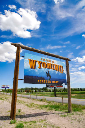 Welcome to Wyoming, a large information sign with wooden stakes along the highway, June 2009のeditorial素材