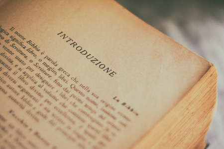 Close-up view of a large ancient bible book, Italian textsの写真素材