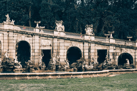 Statues and stone fountains in the large garden of the royal palace of Caserta, Italyのeditorial素材