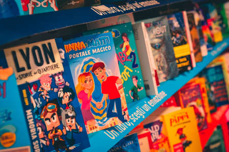The shelf of a supermarket with a variety of children's books, Rome, october 2021のeditorial素材